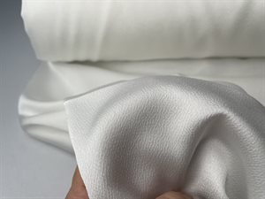 Fastvævet polyester- let offwhite med lidt struktur